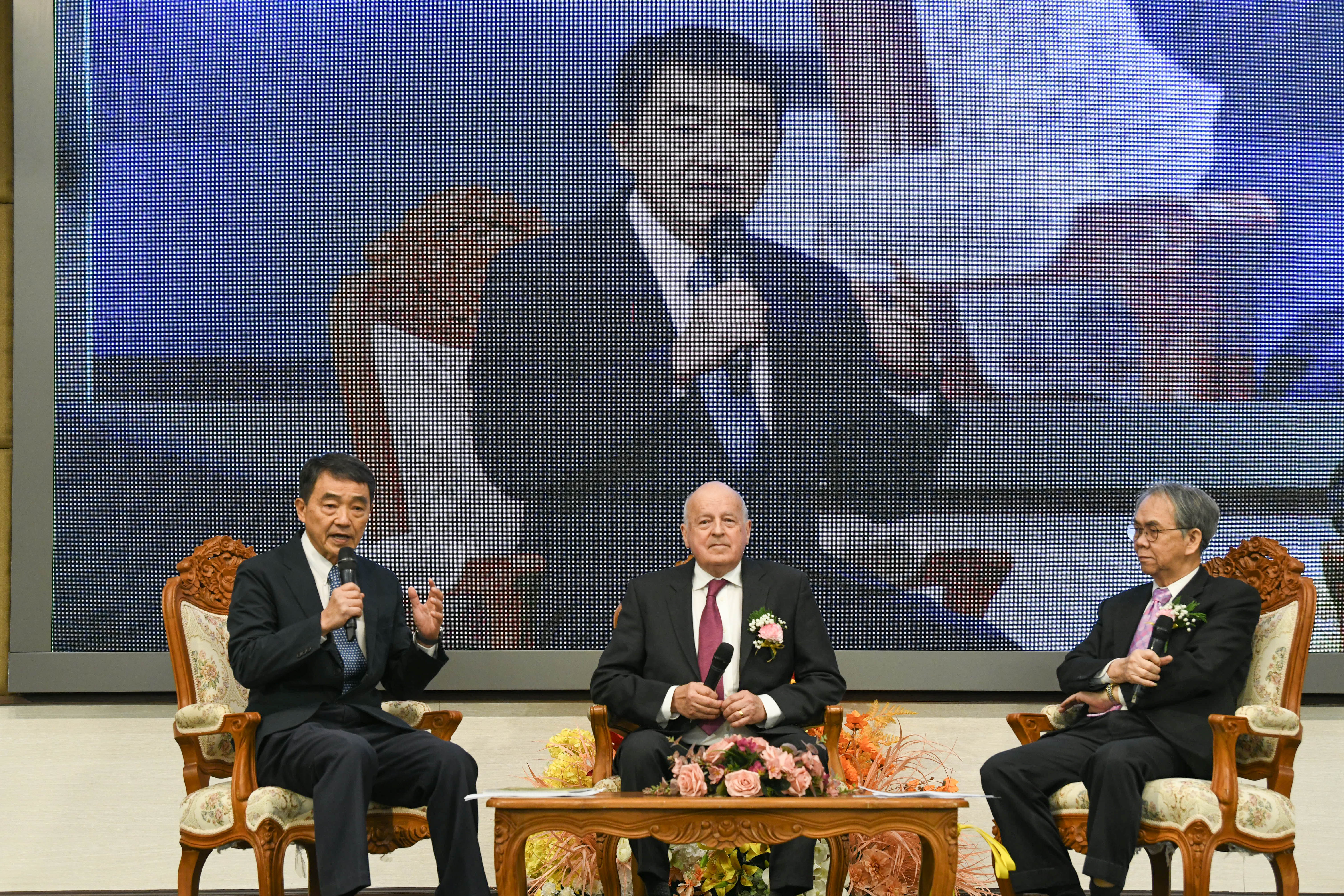 Group of professionals in a meeting, representing partnership and collaboration.